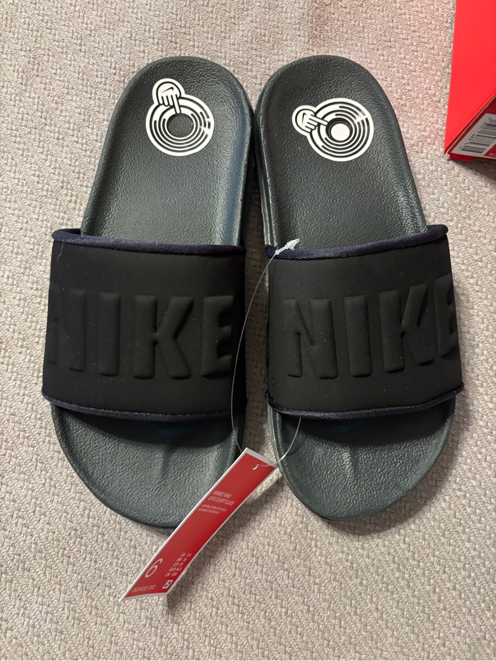 Nike Black womens Slide Sandals with Embossed Logo